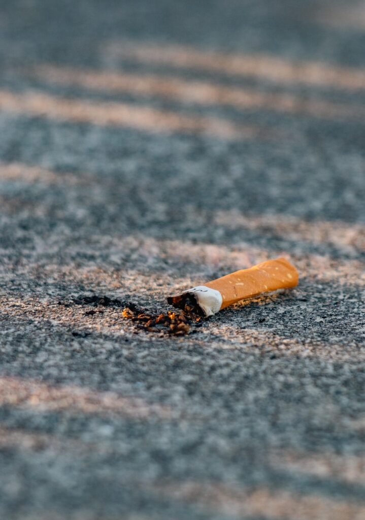 concrete, cigarette, smoking, rubbish, garbage, cigarette, cigarette, cigarette, cigarette, cigarette, smoking, smoking, smoking, garbage